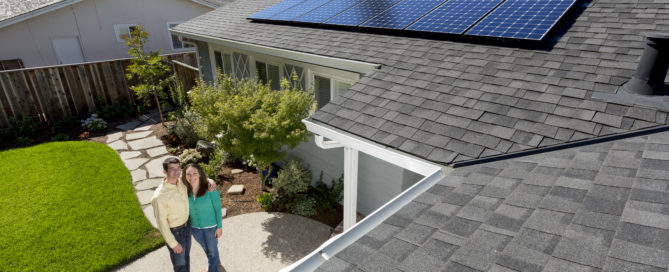 Happy Family With Residential Solar System